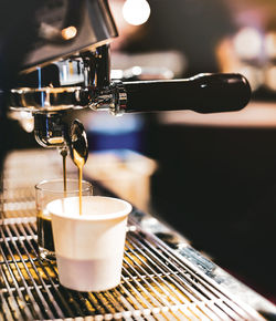 Close-up of coffee cup on table in cafe