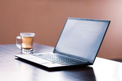 Close-up of laptop on table