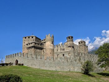 Old ruins against clear blue sky