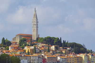 Buildings in city against sky