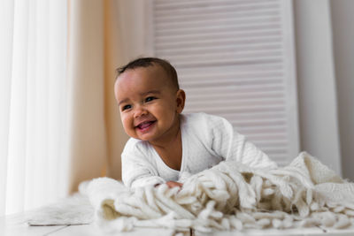 Portrait of cute boy at home