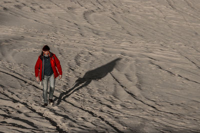High angle view of person on sand at beach