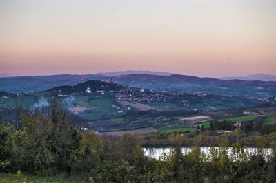 Scenic view of landscape against sky during sunset