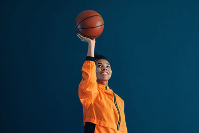 Man playing basketball