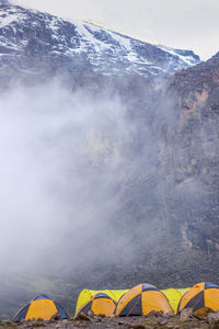 Scenic view of yellow mountain against sky