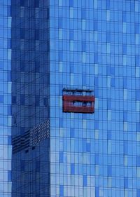 Full frame shot of swimming pool against building