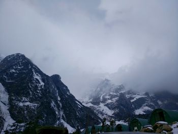 Scenic view of mountains against sky during winter