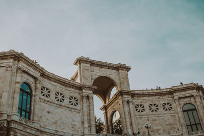 Low angle view of historical building against sky