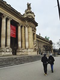 Tourists in front of historical building