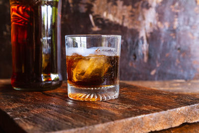 Close-up of beer glass on table