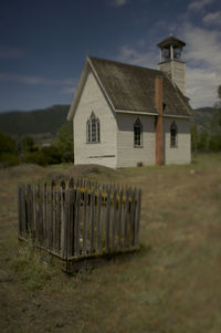 House on field against sky