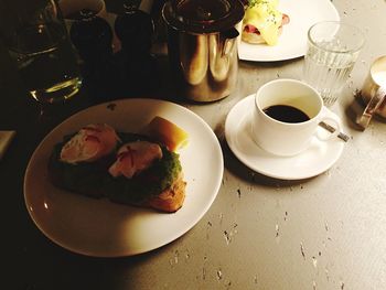 Close-up of coffee served on table