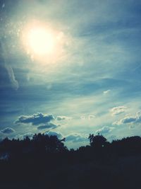 Scenic view of landscape against cloudy sky