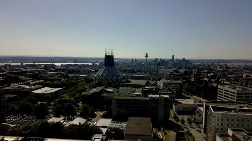 High angle view of buildings against clear sky