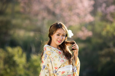 Portrait of a smiling young woman