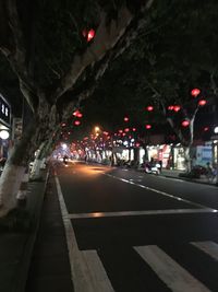 Cars on road at night