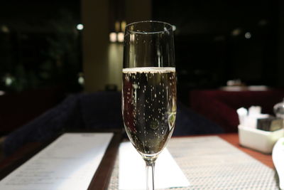 Close-up of wine glass on table in restaurant