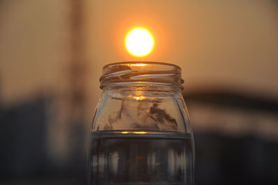 Close-up of glass jar on table