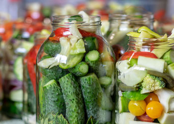 Close-up of chopped vegetables in glass container