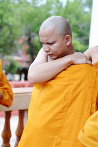 Monk during ordination ceremony at temple