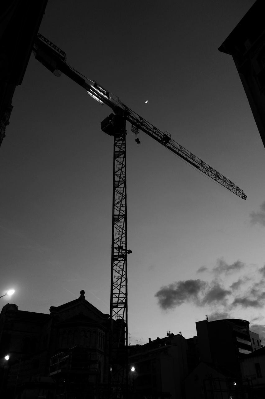 development, sky, low angle view, built structure, construction site, silhouette, no people, outdoors, city, industry, building exterior, construction, architecture, tree, day