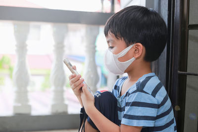 Young woman using mobile phone