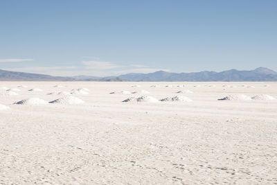 Scenic view of desert against clear sky