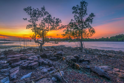 Scenic view of sea against sky during sunset