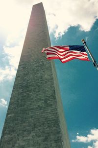 Low angle view of flag against sky