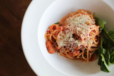 High angle view of pasta in plate on table