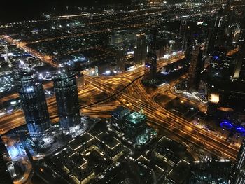 High angle view of illuminated city at night