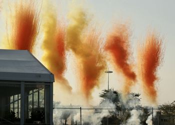 Smoke stacks against sky