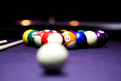 Close-up of multi colored balls on table