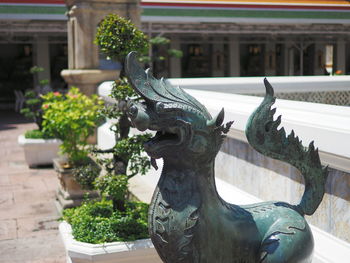 Close-up of statue against temple