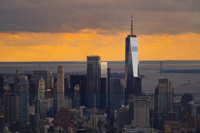 Cityscape against sky during sunset