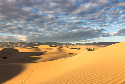 Scenic view of desert against sky