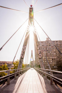 Bridge against sky in city