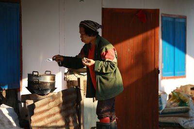 Side view of a man working