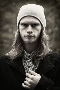 Close-up portrait of man wearing warm clothing