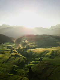 Scenic view of landscape against sky during sunset