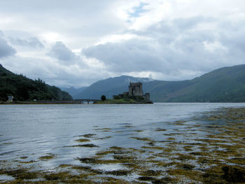 View of lake against cloudy sky