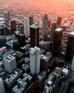 High angle view of modern buildings in city against sky