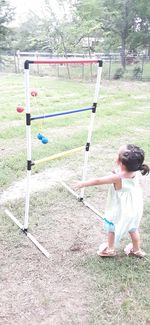 Girl playing on field