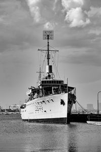 Ship sailing in sea against sky