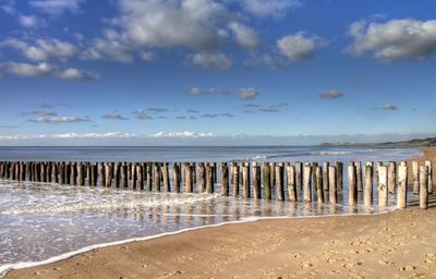 Scenic view of beach against sky
