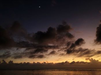 Scenic view of sea against sky at sunset