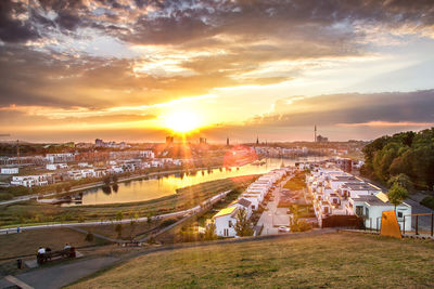 High angle view of cityscape against sky during sunset