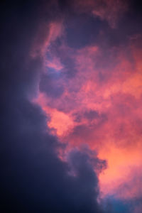 Low angle view of dramatic sky during sunset