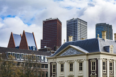 Low angle view of houses against sky