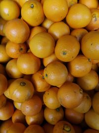 Full frame shot of oranges at market stall